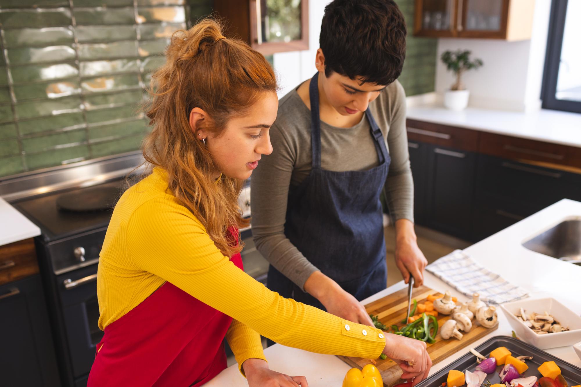 One-on-one coaching with chef in small kitchen