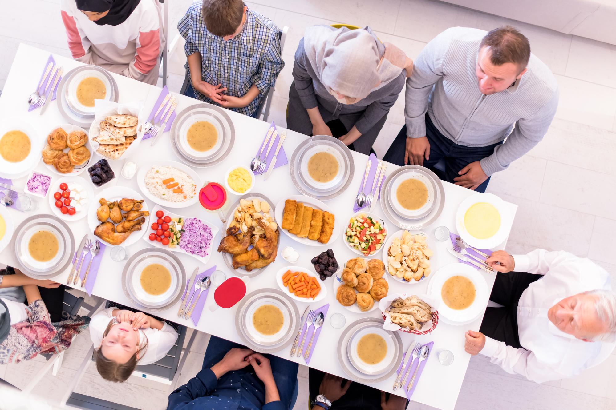 Group event with long communal table and guests